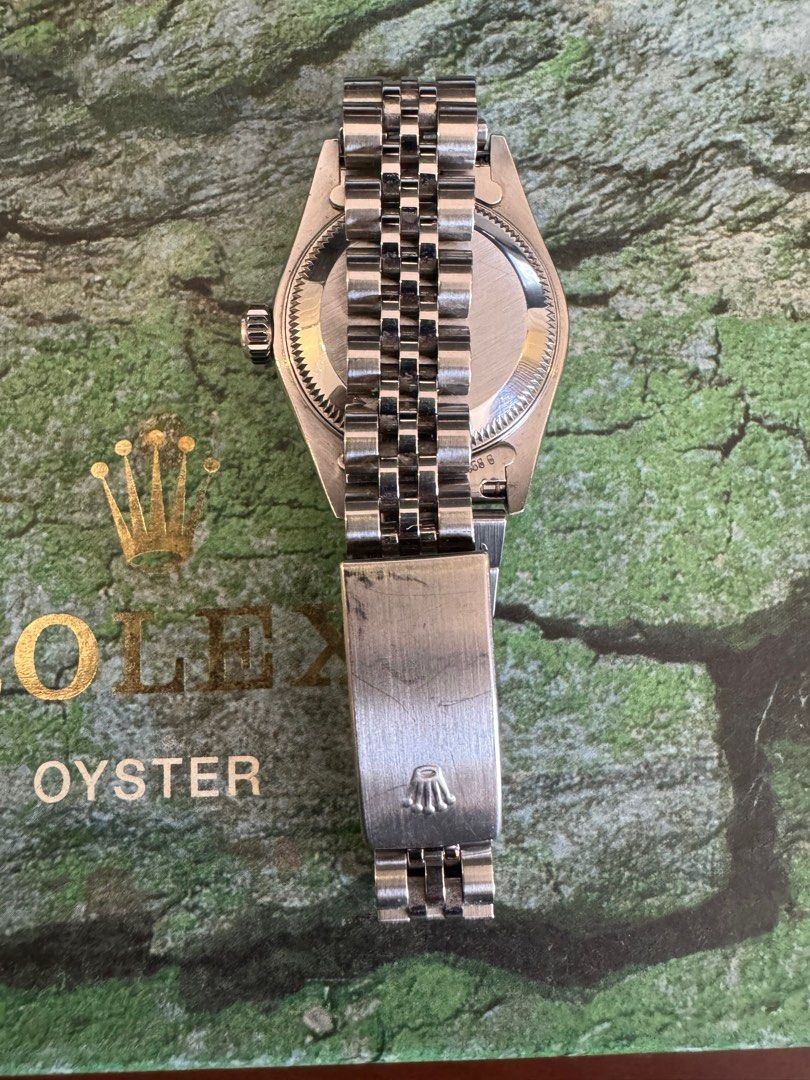 Rolex Datejust 26mm (Category: Luxury Watches) located in Paranaque City. Submitted by jaydy118 (Listing ID 1366039407, Image 3). Description: Brand: Rolex Model: Datejust 26 Case: Steel Bezel: White gold Diameter: 26 mm Bracelet: Steel Jubilee Movement: Automatic Dial: White with roman numerals Glass: Sapphire crystal Condition: 9/10 Watch only Open for verification.