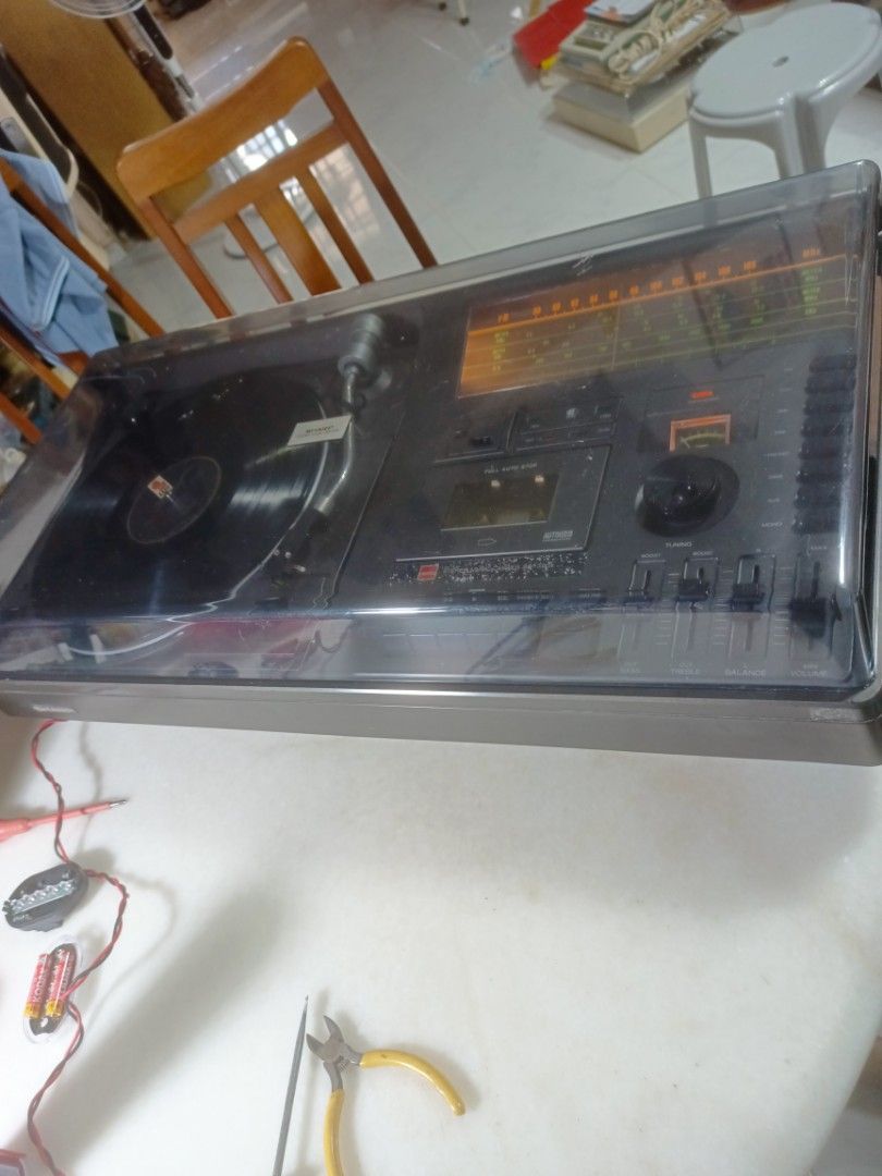 Sharp 3 in 1 set player. (Category: Other Audio Equipment) located in Singapore. Submitted by yankhimt (Listing ID 1366098753, Image 3). Description: Play 33 & 45 record. FM radio working, only cassette player not working.Length- 37cm, diameter 73cm. height- 16cm .Model no- SG 320X..