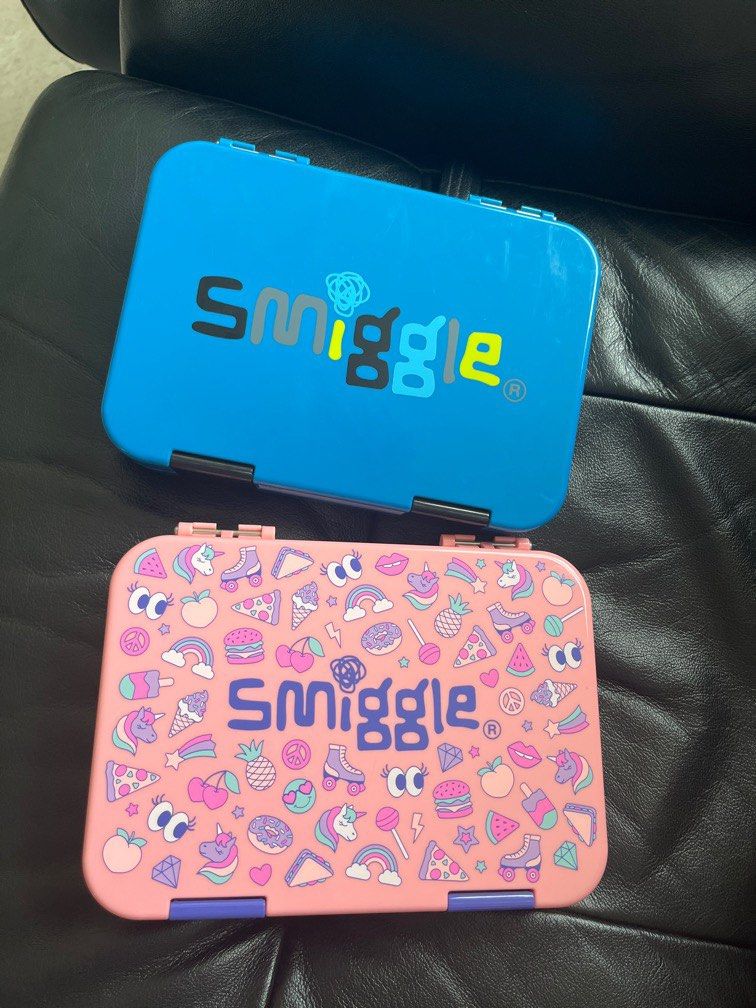 Smiggle lunch box (Category: Other Babies Going Out Needs) located in Singapore. Submitted by mysticfish.219470 (Listing ID 1366086136, Image 1). Description: Washed but not used before Both pink and blue .