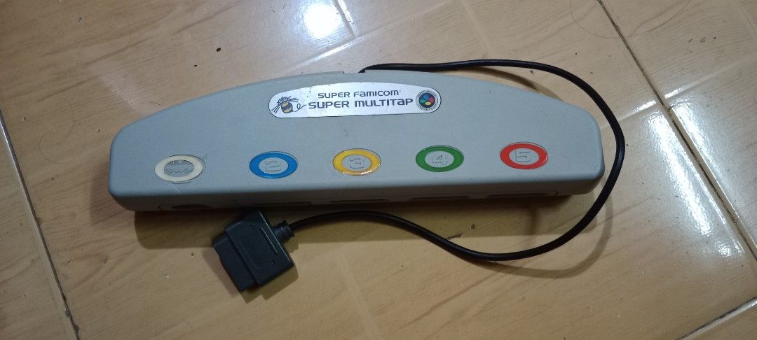 Super Famicom Super Multitap for sale (Category: Controllers) located in Bulacan. Submitted by Shoppe.Ups (Listing ID 1366188441, Image 1). Description: what you see is what you get meetups: guiguinto plaridel bulacan - J&T *(Payment First) - LBC COP/COD *(payment first for shipping fee only) -toktok / lalamove *mop: via gcash pm for interested.