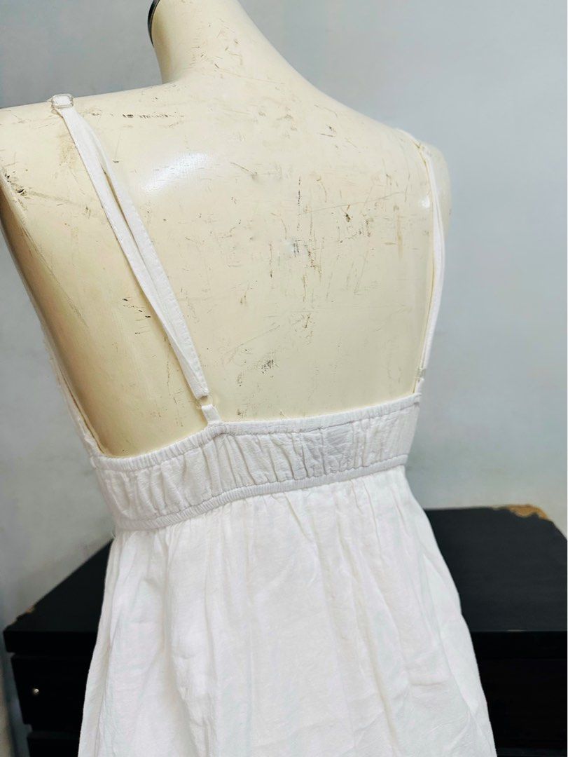 White eyelet summer dress (Category: Dresses) located in Paranaque City. Submitted by mikaaa_y (Listing ID 1366093649, Image 3). Description: Can fit to s-m body frame Adjustable strap .