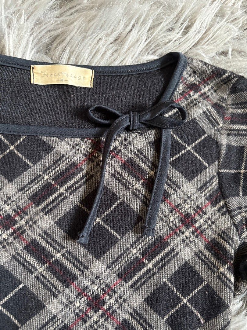 black and gray plaid ribbon top (Category: Longsleeves) located in Quezon City. Submitted by _clemi (Listing ID 1366247741, Image 3). Description: size : small to medium fit : slim fit style : cropped no flaws, minimal lints, soft fabric last price posted 🤍.