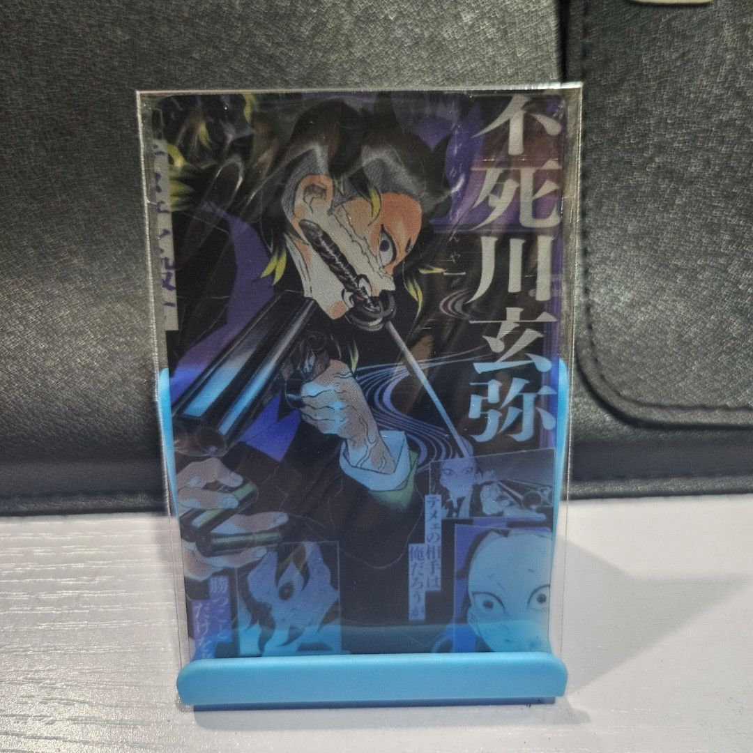 Demon Slayer translucent card - Genya (Category: Raw Singles) located in Manila. Submitted by blackstar027 (Listing ID 1366364091, Image 1). Description: Please refer to the images for the actual item. MOP - gCash - BPI, Union Bank, AUB, ShopiPay.
