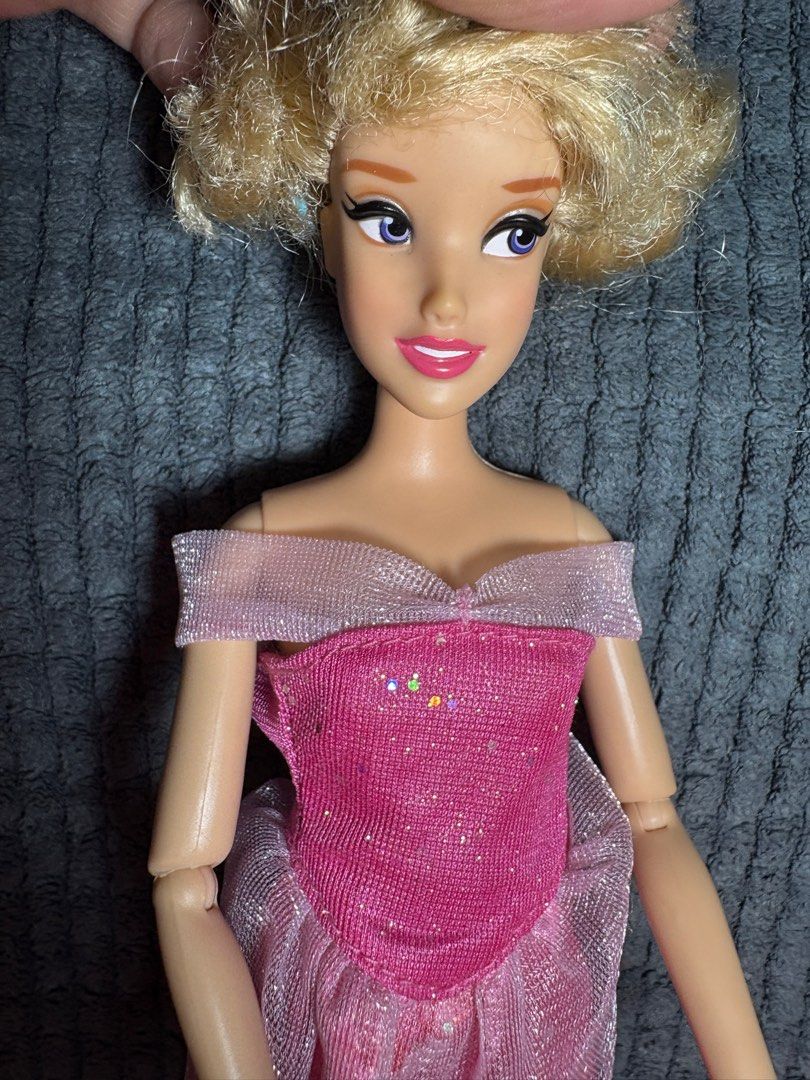 disney store aurora 12" doll (Category: Plushies & Soft Toys) located in Echague. Submitted by tentenheartph (Listing ID 1366353472, Image 2). Description: Preloved from US WYSIWYG hair needs spa not in her og clothes articulated arms tight still rubber legs no crack no bite please manage your expectations buy at your own risk .