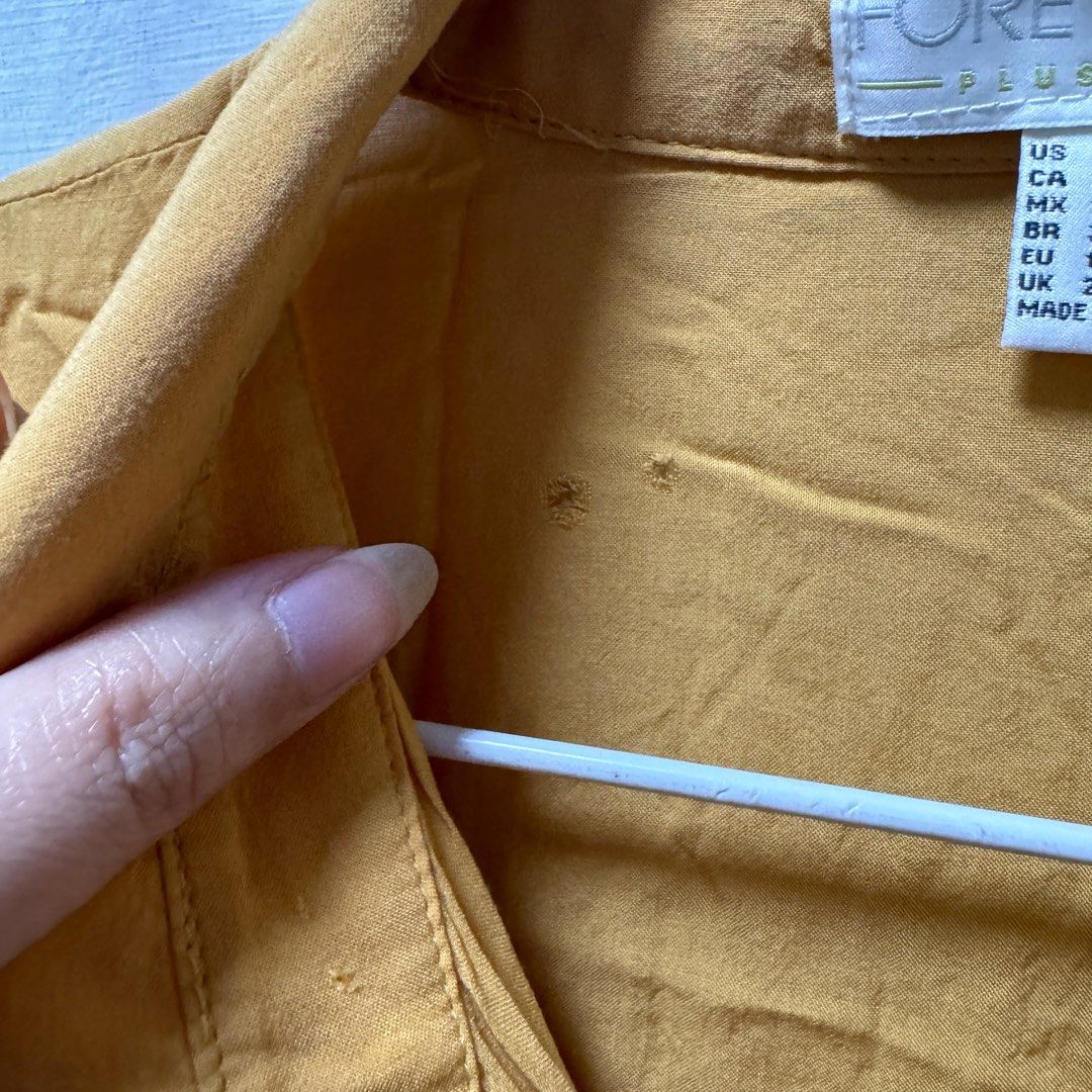 Forever21 plus size blouse top (Category: Blouses) located in Cainta. Submitted by kei_21 (Listing ID 1366292116, Image 3). Description: Closet cleanup sale Decluttering Forever21 Front tie top with collar Size 1x Can fit bust 38, waist 34-36 Mustard yellow With flaw at the back (pls check last photo) Loc: pasig .