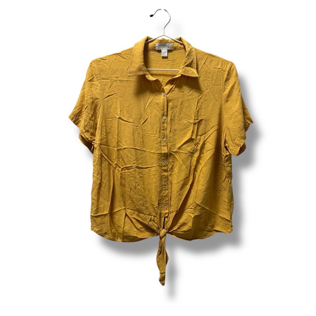 Forever21 plus size blouse top (Category: Blouses) located in Cainta. Submitted by kei_21 (Listing ID 1366292116, Image 1). Description: Closet cleanup sale Decluttering Forever21 Front tie top with collar Size 1x Can fit bust 38, waist 34-36 Mustard yellow With flaw at the back (pls check last photo) Loc: pasig .