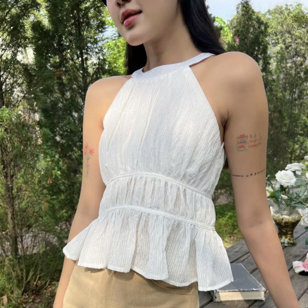 Halter top (Category: Blouses) located in Makati City. Submitted by avlca (Listing ID 1366193182, Image 2). Description: Bought for 675 from $h0p33 RFS: not my style Fits XS to S and stretchy There is a bit of opening at the back Photos are from the app Top looks exactly like the photo 👌🏻.