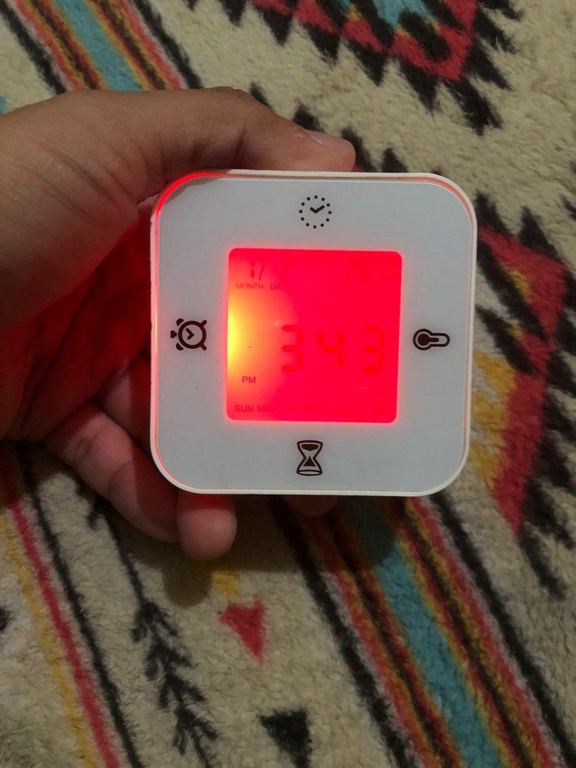 Ikea Klockis multi functional rotate clock (Category: Clocks) located in Quezon City. Submitted by markgolveo (Listing ID 1366223866, Image 1). Description: Ikea Klockis multi functional rotate clock Tested working all features buttons are functional Rotate to change modes Different Lights depending on modes With timer, clock , alarm, temperature.