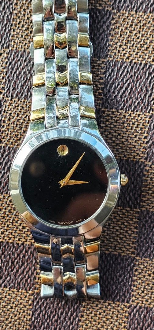 Movado Men's (Category: Luxury Watches) located in Manila. Submitted by shyysandig (Listing ID 1366238875, Image 3). Description: Movado Men's Swiss movement Very good running condition Quartz Keeps accurate time With provided box only.