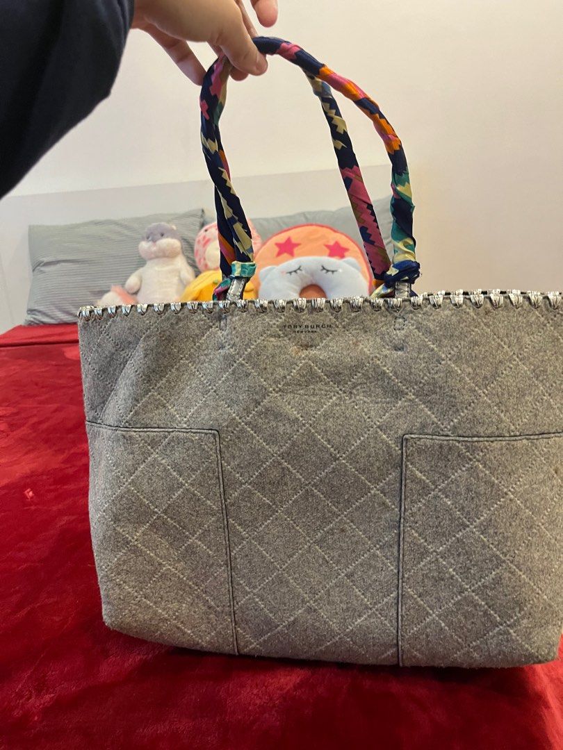tory burch silver tote with wrap on handles (Category: Luxury Bags & Wallets) located in Manila. Submitted by rhiavilla (Listing ID 1366366187, Image 1). Description: the handles are spiky which is why there’s a wrap.