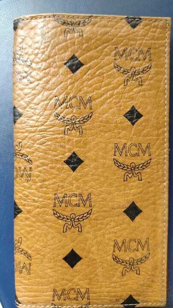 Vintage MCM 1997 (Category: Bags & Wallets) located in Singapore. Submitted by benjisuperstore (Listing ID 1366225753, Image 2). Description: Good condition. Inside one small area is faded. Refer to photo. Current model 9s retailing at 550+. Best buy. Great conversation starter. Rare design today. MCM.