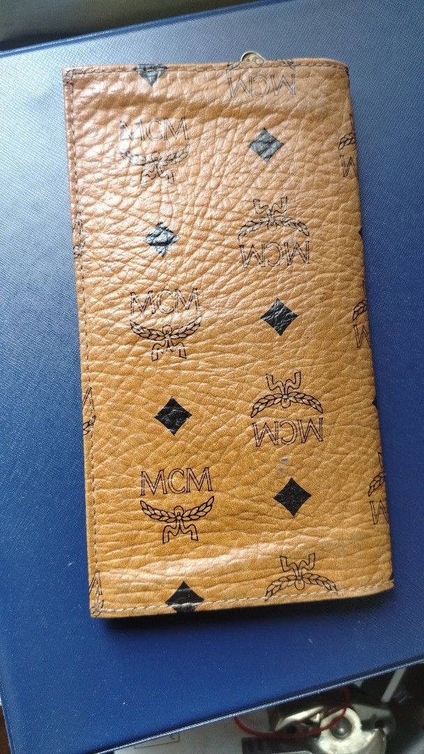 Vintage MCM 1997 (Category: Bags & Wallets) located in Singapore. Submitted by benjisuperstore (Listing ID 1366225753, Image 1). Description: Good condition. Inside one small area is faded. Refer to photo. Current model 9s retailing at 550+. Best buy. Great conversation starter. Rare design today. MCM.