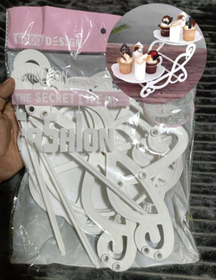 2 layer cupcake stand (Category: Bakeware) located in Manila. Submitted by asstditems (Listing ID 1361709669, Image 1). Description: Same day delivery via Lalamove Location: Manila Mop: Cod/Gcash payment Pm for inquiries..