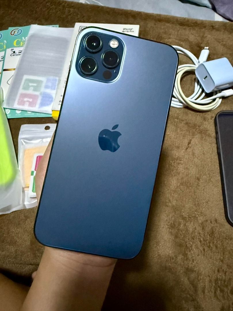 Apple iPhone 12 Pro (256GB) Pacific Blue (Category: iPhone 12 Series) located in Manila. Submitted by staywithreiii (Listing ID 1361760269, Image 3). Description: Apple iPhone 12 Pro (256GB) Pacific Blue Currently at 73% battery health Factory unlocked* (any SIM is okay!) Never been repaired* With some scratches but it doesn't affect the functionality of the phone All buttons are working properly No box and receipt 3rd party cable included (Venti
