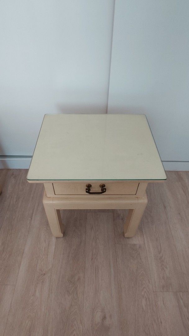 Bedside Table (Category: Tables & Sets) located in Singapore. Submitted by streakin (Listing ID 1361674308, Image 2). Description: Cream bedside table with glass top @ $50 each 21in (W) x ~23in (H) x 18in (D).