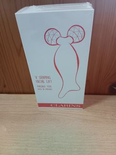 Clarins 二合一按摩儀64168638041217110