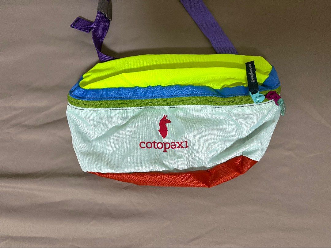 Cotopaxi Del Dia Bataan 3L sling bag / fanny pack (Category: Sling Bags) located in Singapore. Submitted by toobrighttides (Listing ID 1361775944, Image 1). Description: Brand new bag Cotopaxi Del Dia Bataan 3L Each Del Dia product is made proudly in the Philippines by an employee who has total creative control over the pack’s colorway. No two are the same! We’ll choose a pack for you at random. Be prepared for a total surprise! Front zippered po