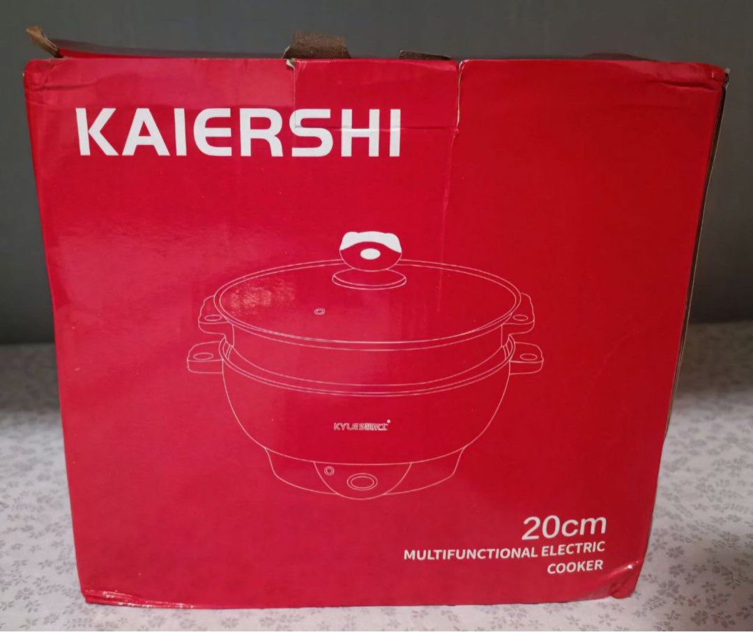 Electric Multicooker (Category: Cookware & Accessories) located in Mandaluyong City. Submitted by prelovedshionista (Listing ID 1361663639, Image 2). Description: 3 button modes Non-stick Slight scratches but still non-stick Location is Carmona Cavite.