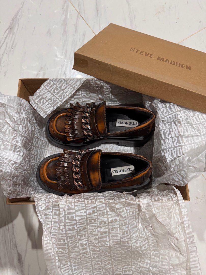 Merits Burnished Steve Madden Loafer (Category: Loafers) located in Cebu City. Submitted by BubbleTees (Listing ID 1361761999, Image 3). Description: Only worn in store when purchased. Very pretty in person! I’ve already added padding on the heel for comfort, but I never got to use this pair. Size: Women’s 6 Original Price: ₱6,250.