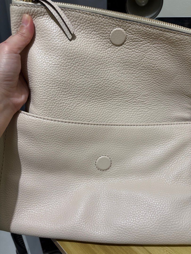 Original Kate Spade cream sling two compartment (Category: Cross-body Bags) located in Manila. Submitted by magimags (Listing ID 1361758976, Image 2). Description: In good condition, with care card , no flaws.