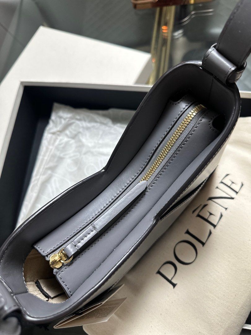 Polene Nodde Hobo Smooth Stone (Category: Luxury Bags & Wallets) located in Paranaque City. Submitted by listitwithb (Listing ID 1361640094, Image 3). Description: Brand new & complete Bought in Polene Tokyo The “Nodde Hobo,” whose name echoes the French word for “knot,” is made up of two perfectly symmetrical, intertwined leather modules. Its beveled design accentuates its dynamic design and its base, set into the main body of the bag using a di