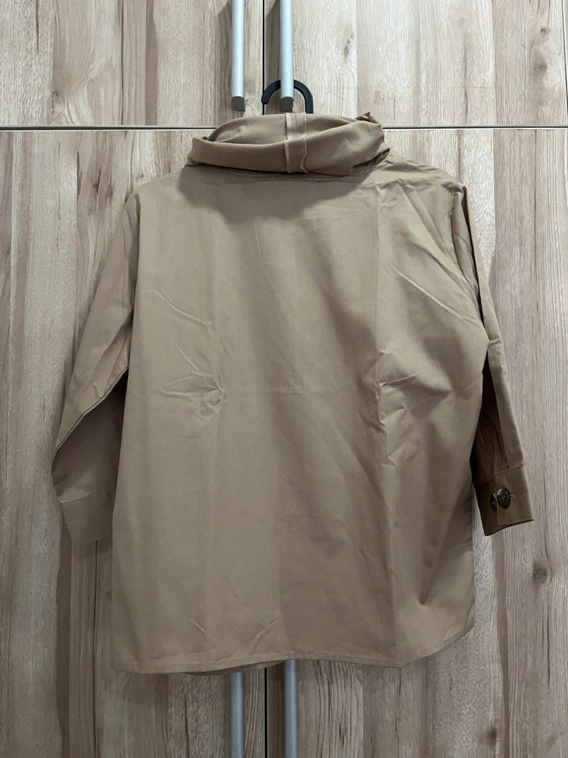 Unif0rm Joy Cowl Neck Top (beige, small) (Category: Blouses) located in Quezon City. Submitted by bonkee_declutters (Listing ID 1361677352, Image 2). Description: Used once, very good condition No flaws, alterations or stain RFS: decluttering Estimated size when laid flat: Width - 20 inches Length - 22 inches.