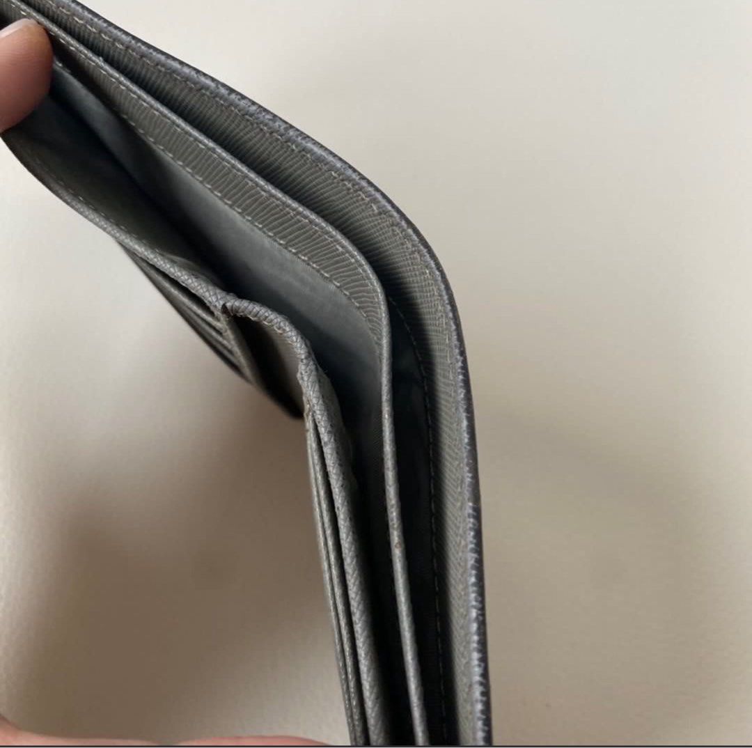 Authentic Prada Wallet (Category: Luxury Bags & Wallets) located in Manila. Submitted by cju_0416 (Listing ID 1366475328, Image 3). Description: Well used Need spa .
