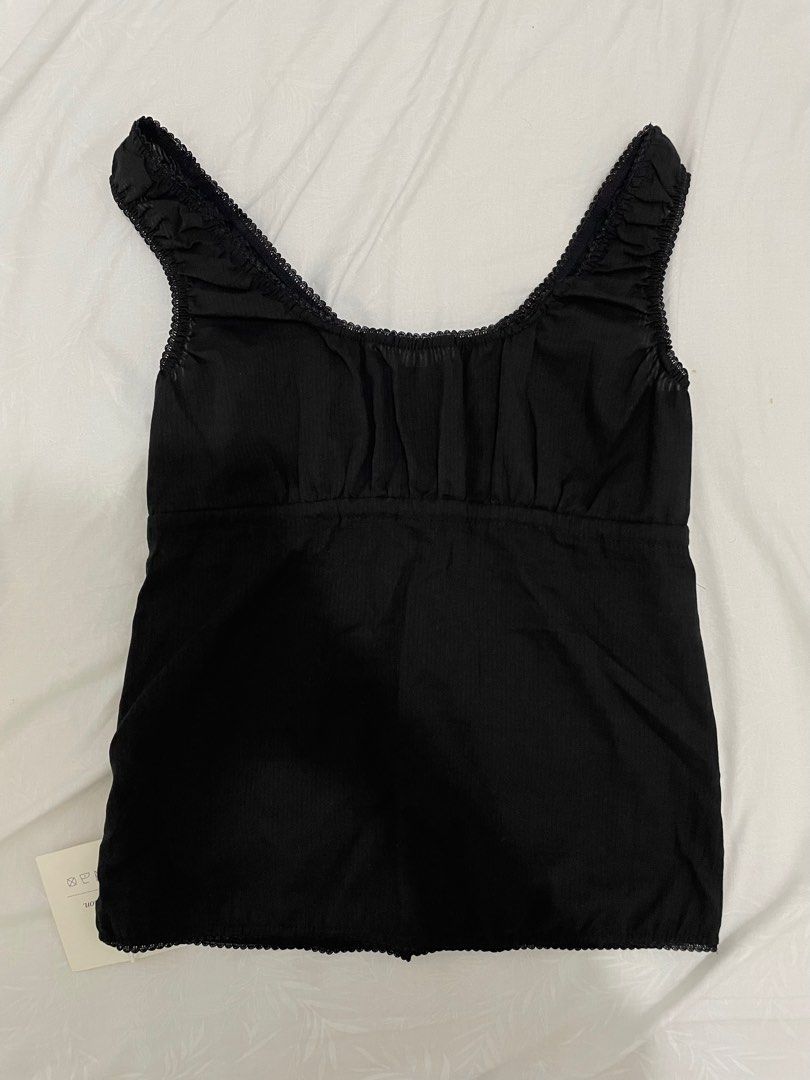 Bkk Dainty Black Top (Category: Sleeveless) located in Manila. Submitted by kayesells_ (Listing ID 1366393512, Image 3). Description: bought from decembers bnew freesize, fits small to large no when worn firm price, won’t entertain lowballers mod: jnt or lalamove loc: sampaloc, manila mop: gcash or bpi.