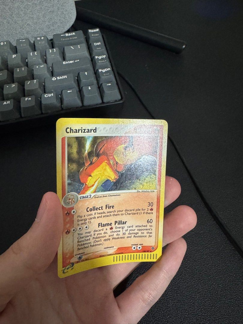 2003 Charizard (Category: Raw Cards) located in Singapore. Submitted by chocbar (Listing ID 1366519623, Image 3). Description: Condition as shown Ex dragon holo charizard raw Pokemon trading card game.