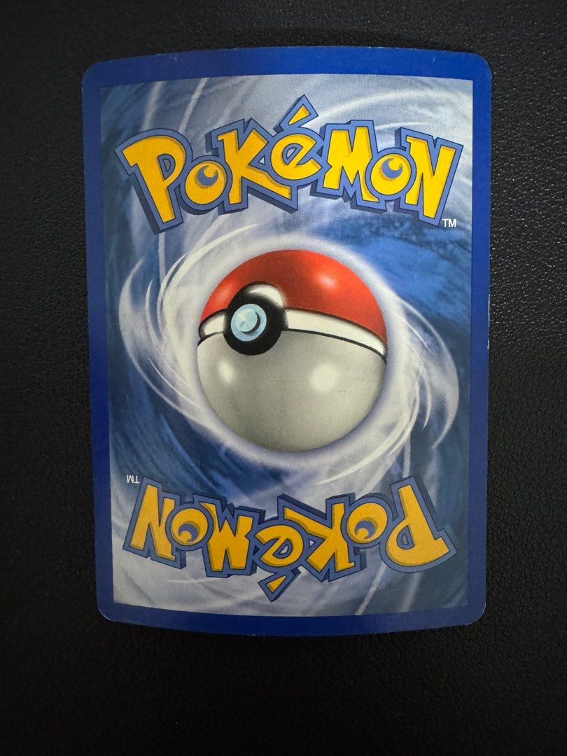 2003 Charizard (Category: Raw Cards) located in Singapore. Submitted by chocbar (Listing ID 1366519623, Image 2). Description: Condition as shown Ex dragon holo charizard raw Pokemon trading card game.