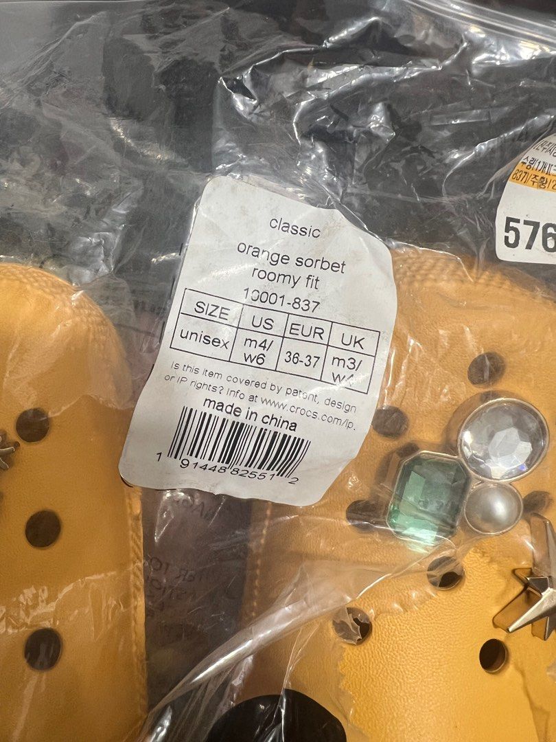RUSH!!!! Crocs Classic Clogs W6 (Category: Slippers and slides) located in Antipolo. Submitted by luxurieslvoes (Listing ID 1366407399, Image 3). Description: Original Crocs Classic Orange Sorbet W6 Brande And Original Original Jibbitz Included Lalamove Ready.