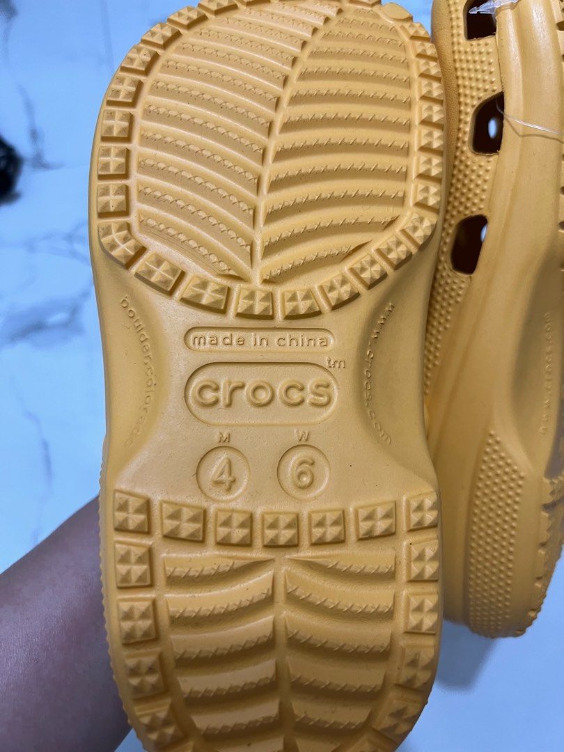 RUSH!!!! Crocs Classic Clogs W6 (Category: Slippers and slides) located in Antipolo. Submitted by luxurieslvoes (Listing ID 1366407399, Image 2). Description: Original Crocs Classic Orange Sorbet W6 Brande And Original Original Jibbitz Included Lalamove Ready.