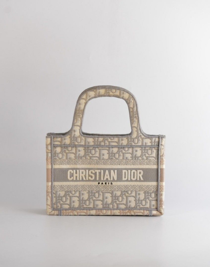 Dior Book Tote Mini Bag In Gray (Category: Luxury Bags & Wallets) located in Taguig. Submitted by pursemaison (Listing ID 1366509237, Image 1). Description: Dior Book Tote Mini Bag In Gray Price: Php 78,000.00 *Additional 4.20% for straight credit card payments *Available for layaway with 1% interest per month (subject to terms & conditions under our Layaway Program) *BDO Credit Card: Up to 36 months installment (1% interest + 2.15% platform fee 