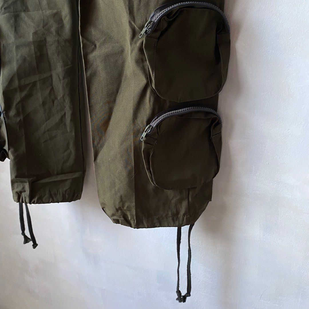 Eden Multipocket Flight Cargo Pants (Category: Trousers) located in Manila. Submitted by dailypickups_ (Listing ID 1366475674, Image 3). Description: Size: 32-34 Waist Condition: 10/10 Dimensions Length: 41” Inseam: 29” Thigh: 11.5” Knee: 8.5” Leg opening: 7.5” Front rise: 12”.