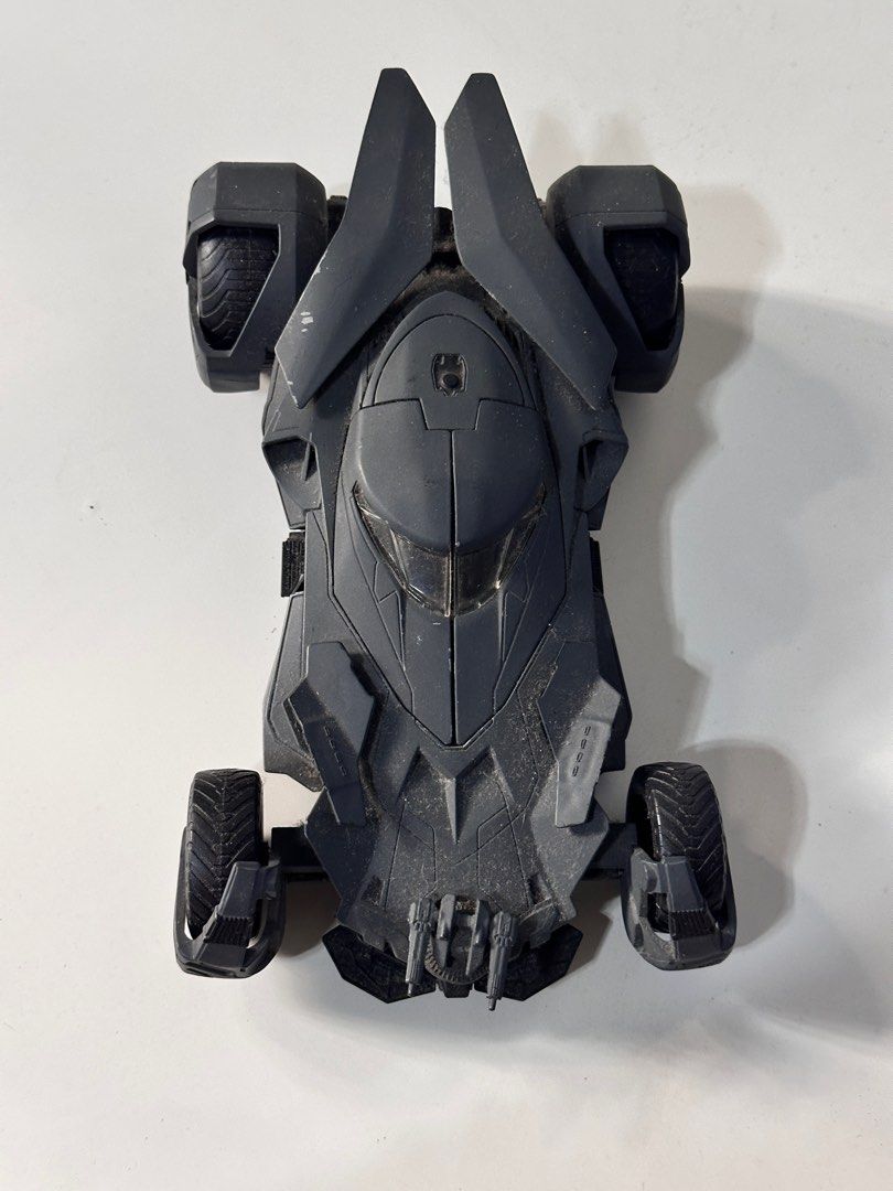 Jada Batman v Superman Batmobile 1:24 (Category: Vehicle & Diecast Models) located in Manila. Submitted by dc_stan_account (Listing ID 1366462729, Image 1). Description: Price negotiable. No box. with minor scratches that add character/weathered look..