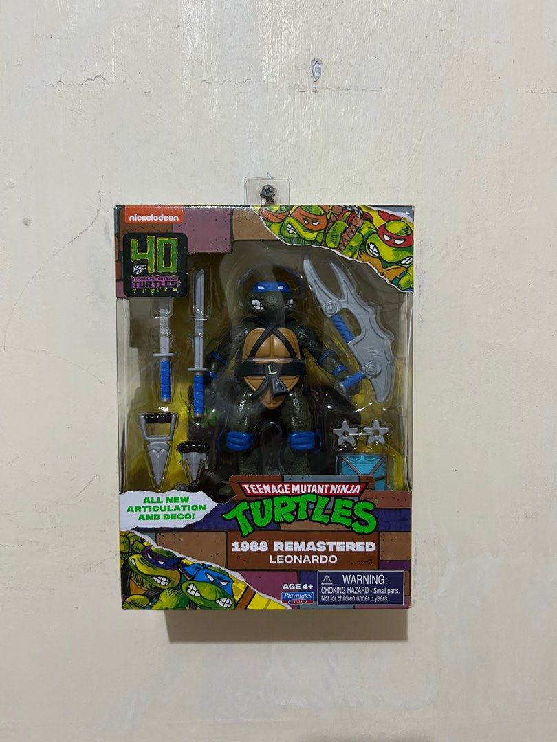 Leonardo - TMNT 1988 Remastered Action Figure (Category: Figurines & Statues) located in Apalit. Submitted by ariennejohn (Listing ID 1366417381, Image 1). Description: Teenage Mutant Ninja Turtles 1988 Remastered Action Figure – Leonardo Playmates, 2024 release Brand new Sealed, never opened.