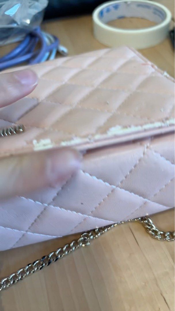 Love Moschino Quilted Chain Bag (Category: Bags & Wallets) located in Singapore. Submitted by lhsa91 (Listing ID 1366415536, Image 2). Description: This Love Moschino quilted chain bag is a stylish and practical option for everyday use. It features a classic quilted design and a gold chain strap. The bag is in well-used condition, with wear and tear on the edges. The button still works very well and the inside is in good condition. The chain is a