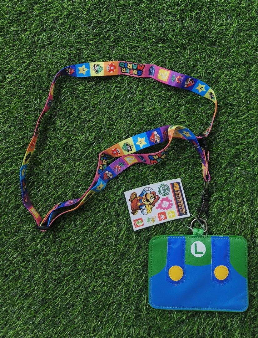 Luigi (Super Mario) ID jacket and lace (Category: Coats, Jackets and Outerwear) located in Baguio. Submitted by ukay_district (Listing ID 1366484232, Image 1). Description: Luigi (Super Mario) ID jacket and lace still with tag 180.