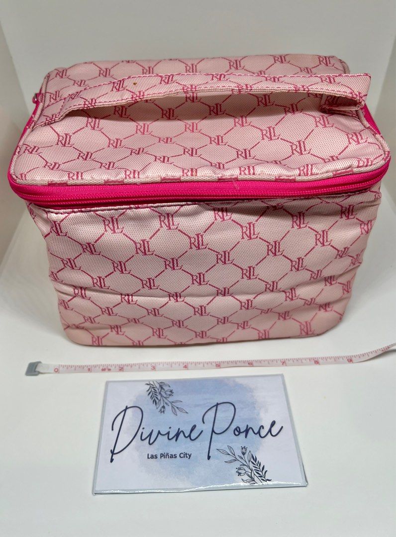 Original Ralph Lauren Make up pouch vanity kit (Category: Purses & Pouches) located in Las Pinas. Submitted by chowyu (Listing ID 1366490691, Image 2). Description: Original Ralph Lauren Make up pouch / vanity kit / Toiletry kit Light makeup stain on the zipper but barely noticeable. Excellent condition. Clean inetrior. Can hold lots of makeup products and toiletries. It’s PINK and it’s so classy! All over print RL logo. Original. I tried to my b