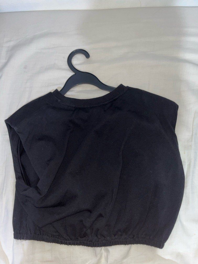 Y2K punk vintage top (Category: Sleeveless) located in Singapore. Submitted by rianaoberoi8 (Listing ID 1366493488, Image 2). Description: Padded shoulders Bought at $50 .