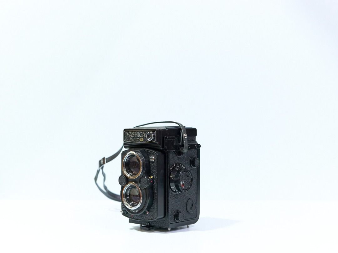 YASHICA MAT 124G TLR MEDIUM FORMAT FILM CAMERA BUNDLE (Category: Cameras) located in Quezon City. Submitted by flikeminks (Listing ID 1366504809, Image 1). Description: YASHICA MAT 124G TLR MEDIUM FORMAT FILM CAMERA BUNDLE Vintage compact TLR camera with fixed 80mm f/3.5 lens Cosmetics: 9/10; very minor signs of use (always used with leather case) Functionality: 10/10; light meter confirmed working Optics: 8/10; no fungus, no scratches, some noti