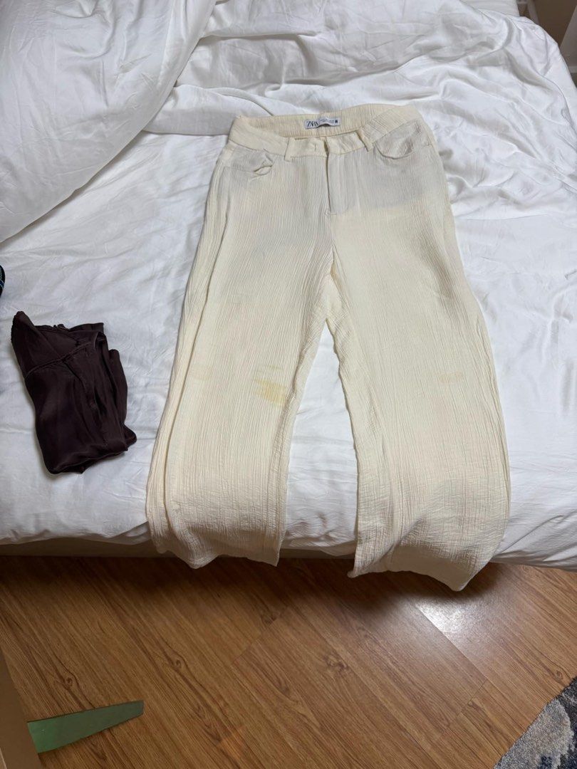 Zara Cream Crepe Pants (Category: Other Bottoms) located in Antipolo. Submitted by robmack (Listing ID 1366516986, Image 1). Description: - has a stain on the right knee, but overall still in good condition - owner has 27” waist, 34” bust, 154cm height - decluttering, please PM me for details - SF shouldered by buyer - MOP: BPI or gcash .