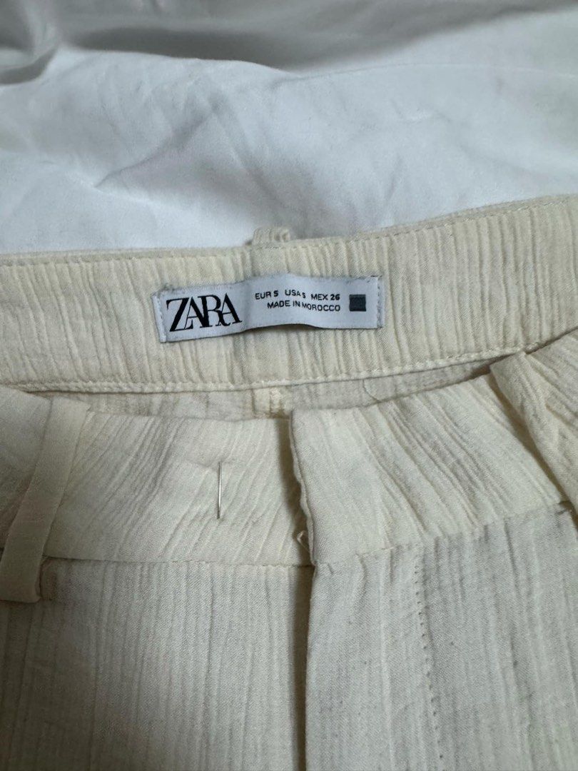 Zara Cream Crepe Pants (Category: Other Bottoms) located in Antipolo. Submitted by robmack (Listing ID 1366516986, Image 2). Description: - has a stain on the right knee, but overall still in good condition - owner has 27” waist, 34” bust, 154cm height - decluttering, please PM me for details - SF shouldered by buyer - MOP: BPI or gcash .