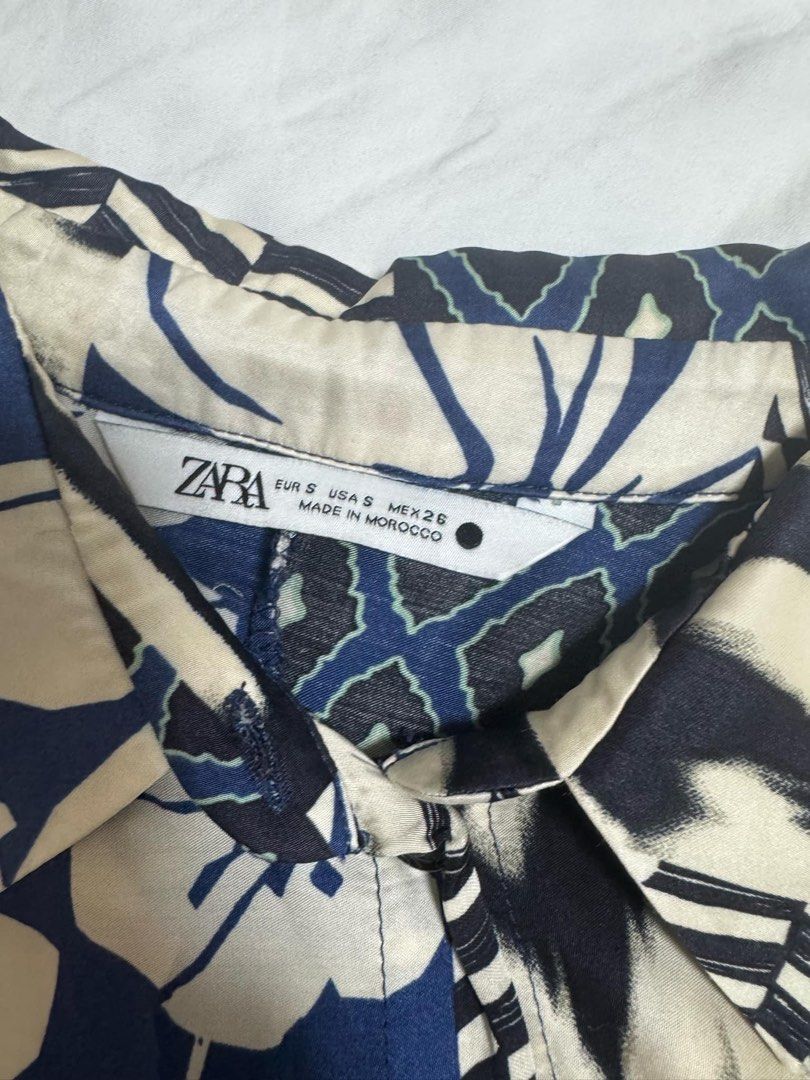 Zara Printed Satin-like Button Down (Category: Blouses) located in Antipolo. Submitted by robmack (Listing ID 1366516712, Image 2). Description: - owner has 27” waist, 34” bust, 154cm height - decluttering, please PM me for details - SF shouldered by buyer - MOP: BPI or gcash .