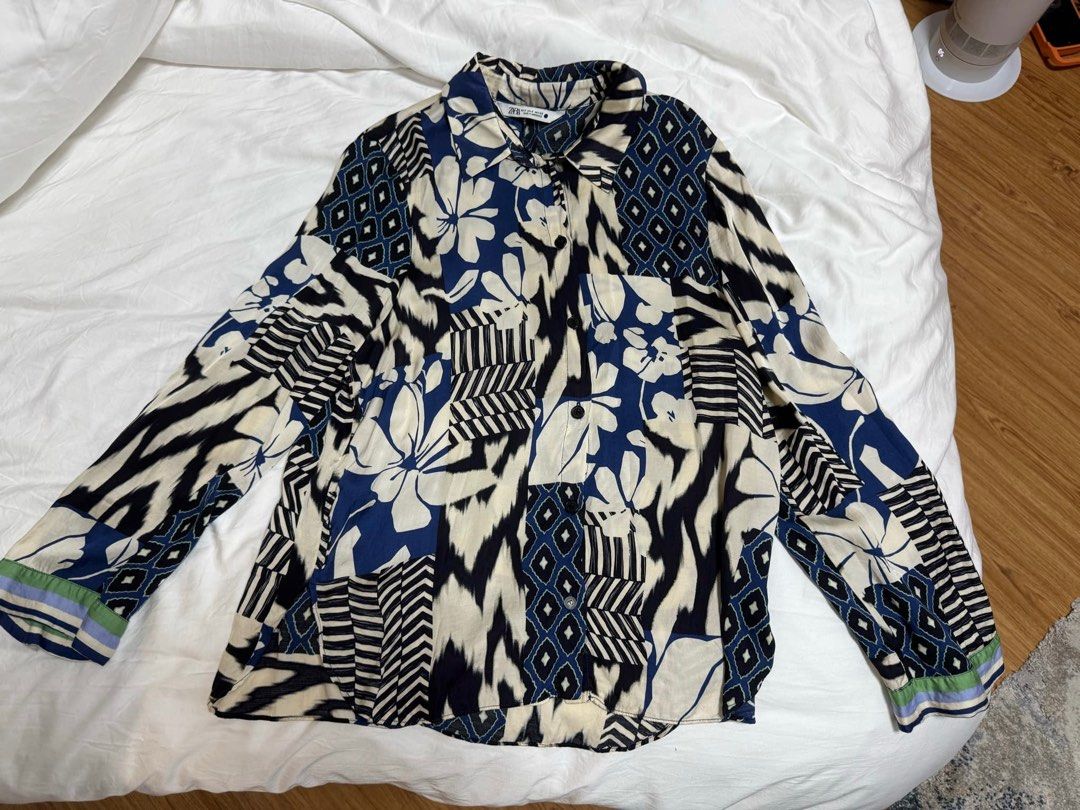 Zara Printed Satin-like Button Down (Category: Blouses) located in Antipolo. Submitted by robmack (Listing ID 1366516712, Image 1). Description: - owner has 27” waist, 34” bust, 154cm height - decluttering, please PM me for details - SF shouldered by buyer - MOP: BPI or gcash .