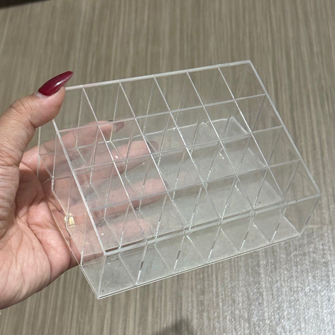 24 Slots Lipstick Acrylic Organizer (Category: Makeup) located in Manila. Submitted by fruityyypoppin (Listing ID 1361901314, Image 2). Description: • Rfs: decluttering • a bit dirty, but can be cleaned.