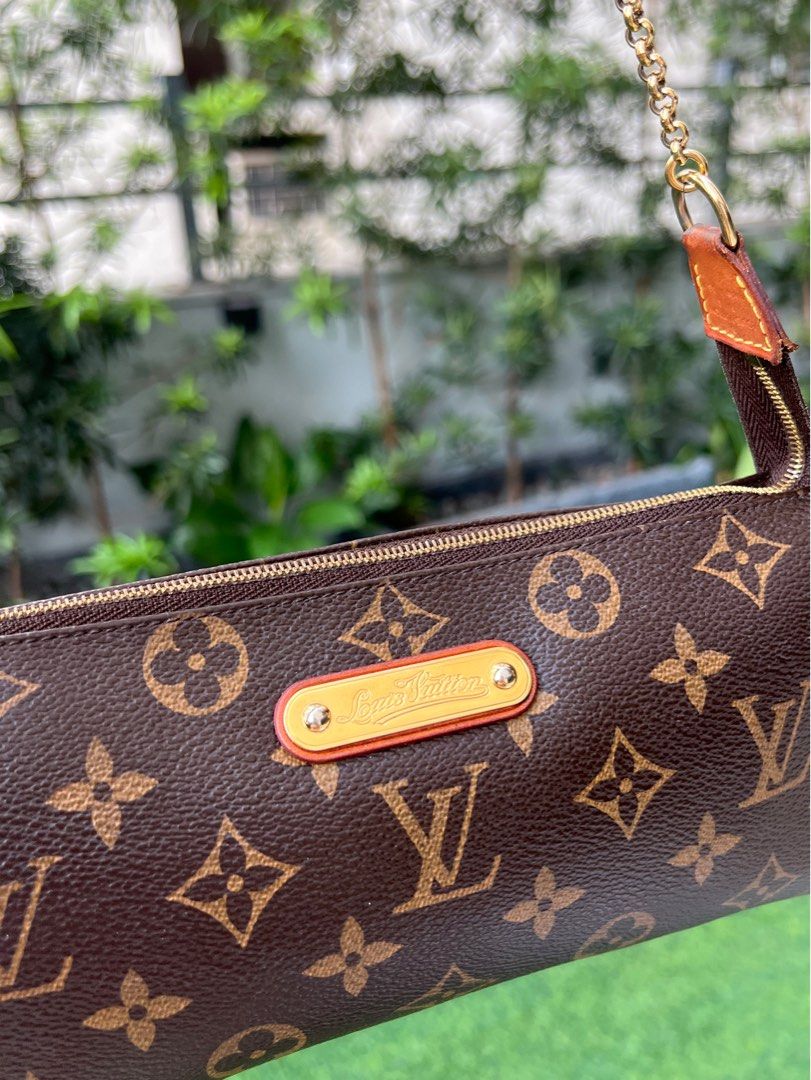 Authentic Louis Vuitton Eva Monogram Clutch Two-Way Shoulder Bag (Category: Luxury Bags & Wallets) located in Makati City. Submitted by cindiorella (Listing ID 1360514656, Image 2). Description: 100% guaranteed authentic Comes with dust bag & long vachetta strap Date Code: SD2059.