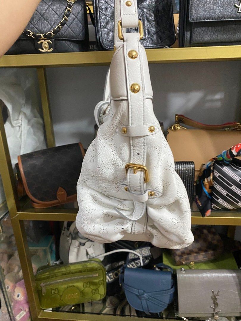 Authentic Lv Mahina Shoulder bag (Category: Luxury Bags & Wallets) located in Quezon City. Submitted by jhaediah (Listing ID 1361889399, Image 3). Description: with dustbag rank Ab ++ Original preloved code: 29.