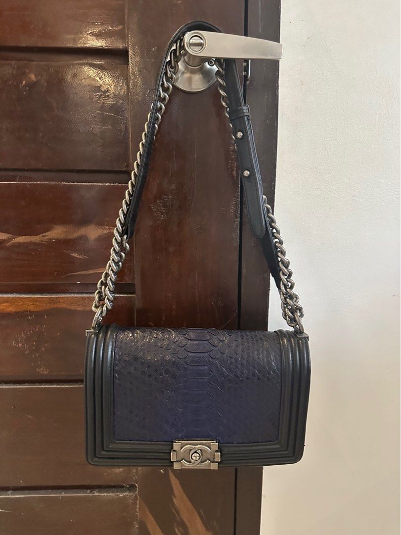 CC Leboy (Category: Luxury Bags & Wallets) located in Batangas. Submitted by kulilayfinds (Listing ID 1361879649, Image 1). Description: A personal favorite! Has signs of use but so pretty in person! Unique snakeskin design in this dark blue color. With flaws so selling low. RFS : decluttering.