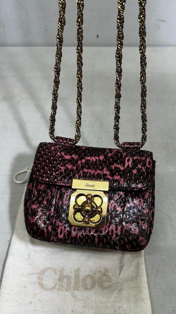 CHLOE Mini Python (Category: Luxury Bags & Wallets) located in Quezon City. Submitted by akinayan17 (Listing ID 1361825341, Image 2). Description: Guaranteed Authentic CHLOE Mini Python Rare/Exotic Unused / Just kept and comes complete -can request for additional pictures. Please send me a message.